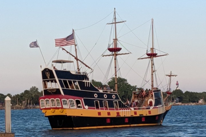 a small boat in a large body of water