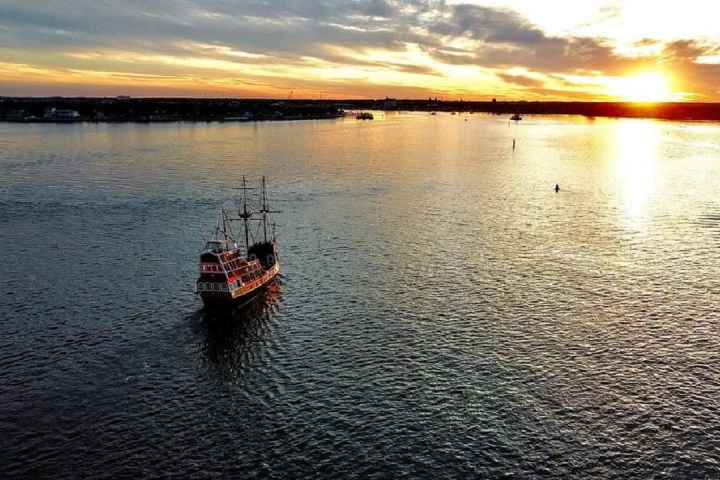 a small boat in a large body of water