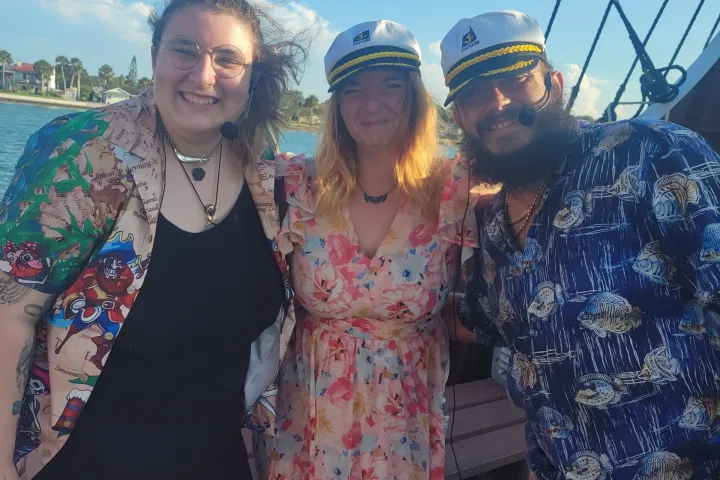 a group of people posing for the camera